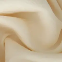 Cremefarbener Stoff, der sich weich anfühlt. Ideal zum **polyamid waschen** und pflegen.