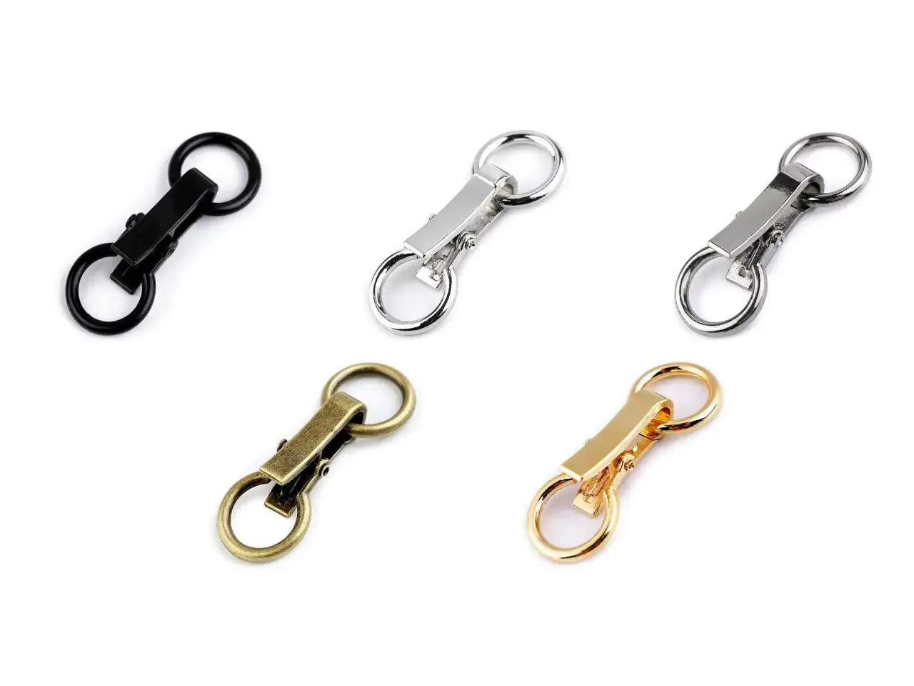 Fünf verschiedene Verschlüsse für Jacken ohne Knöpfe: schwarz, silber, antik-silber, gold und messing.